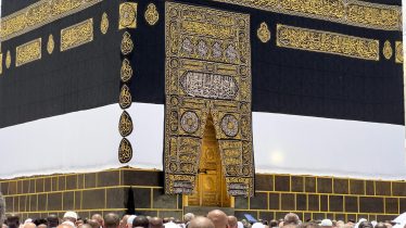 A gathering of pilgrims around the sacred Kaaba in Mecca, a significant Islamic site.